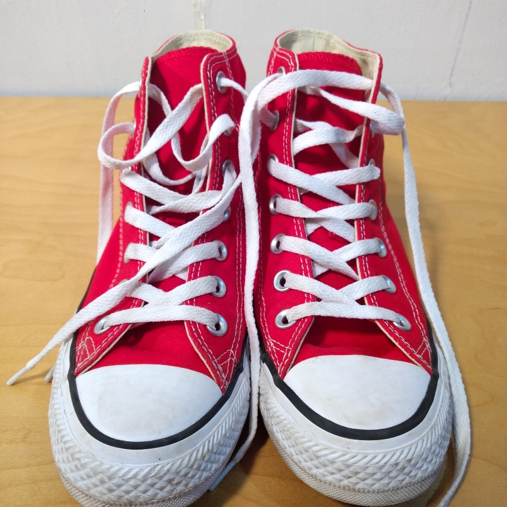 Red Converse high top sneakers
